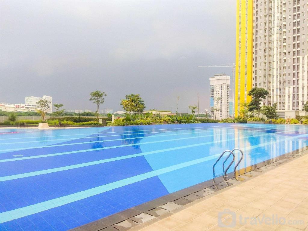 Gorgeous 2BR Springlake Summarecon Apartment By Travelio photo 2