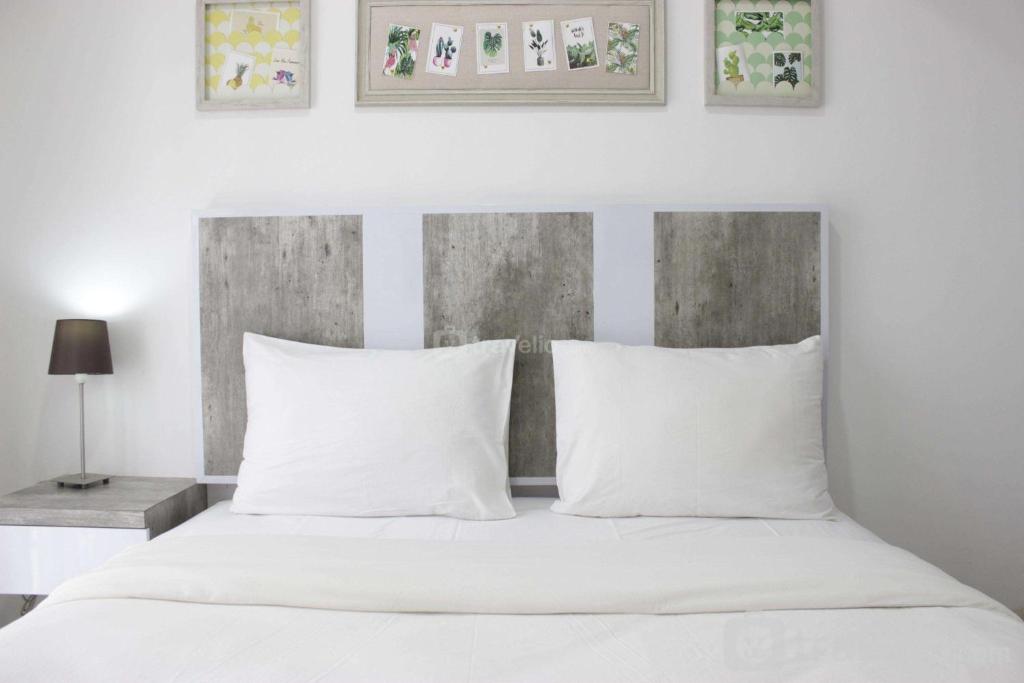 Modern Look Studio Apartment at Grand Asia Afrika By Travelio