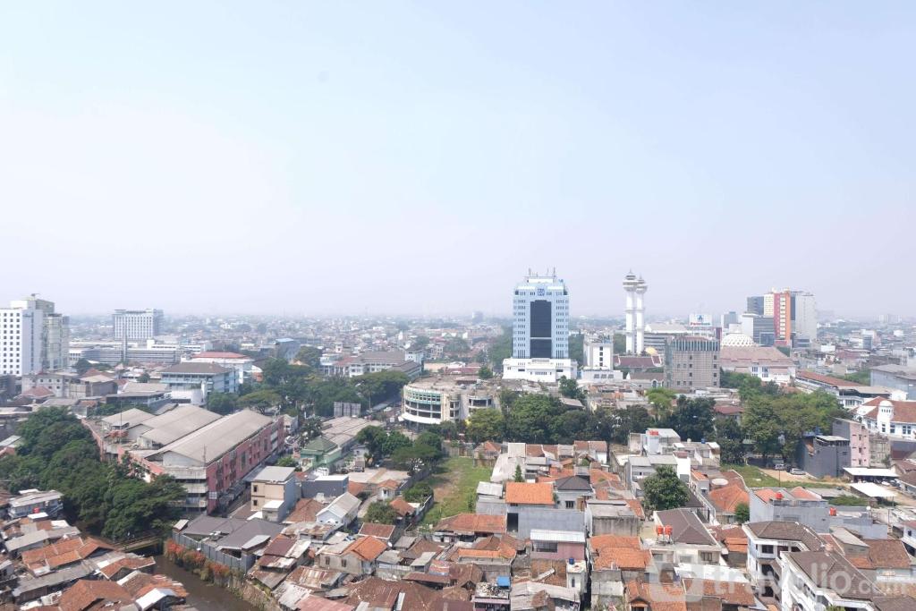 Strategic and Comfy 1BR at Braga City Walk Apartment By Travelio photo 1