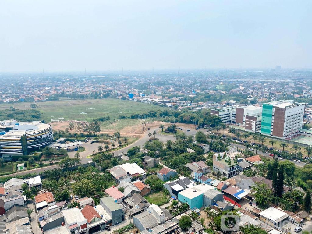 ice and Modern 2BR Springlake Summarecon Bekasi Apartment By Travelio photo 4