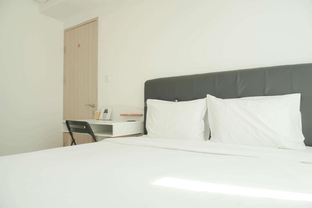 Restful and Comfy 2BR Tokyo Riverside PIK 2 Apartment By Travelio