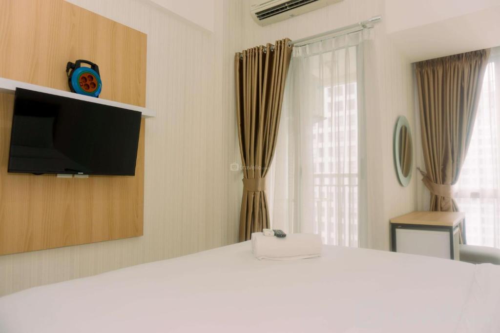 Simply Look and Homey Studio Apartment at M-Town Residence By Travelio