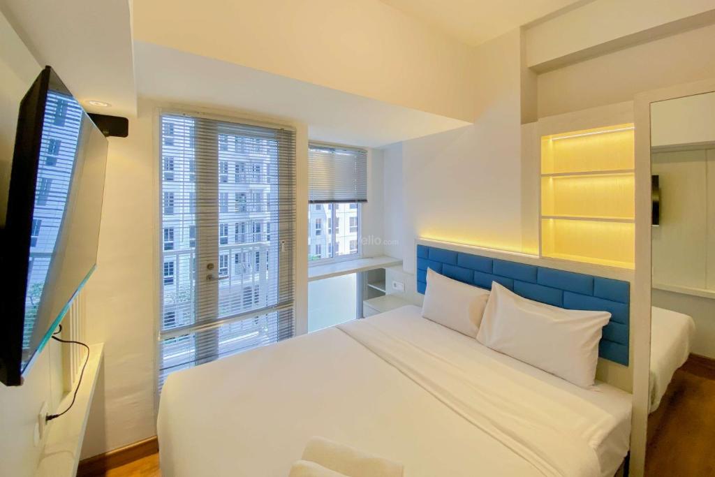 Simply and Homey Studio Tokyo Riverside PIK 2 Apartment By Travelio