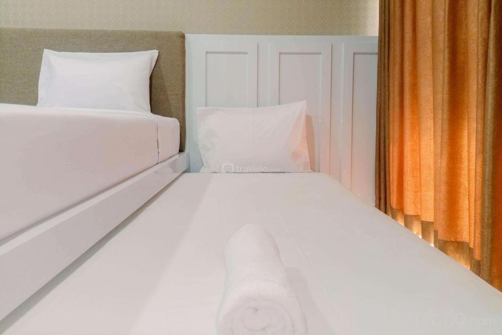 Great Deal and Homey Studio Room Patraland Amarta Apartment By Travelio