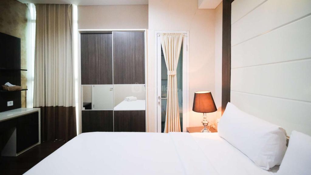 Rooms of Best Location and Tidy 2BR Apartment at Trillium Residence By Travelio