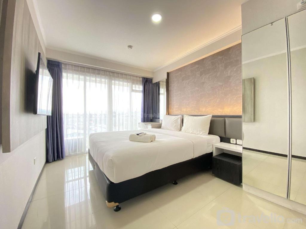 Rooms of Cozy Studio Apartment at Gateway Pasteur By Travelio
