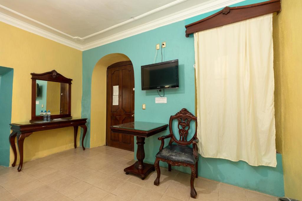 Hotel Casa Dulce Maria - Tap to explore photos