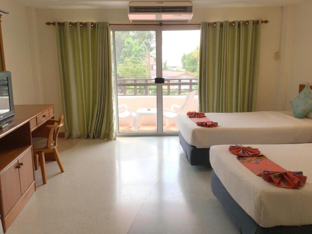 Двухместный (Улучшенный двухместный номер с 1 кроватью), Thip Residence Boutique Hotel