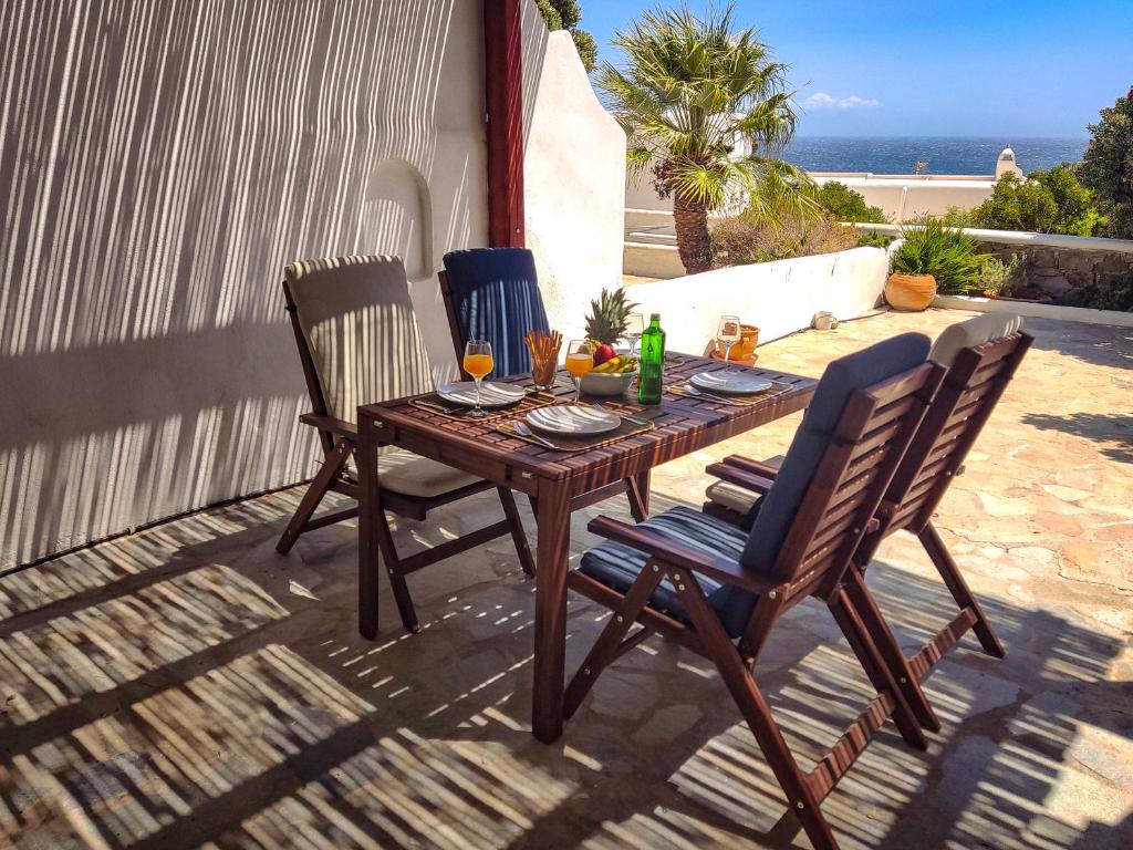 Sunny Getaway in Mykonos Lia Beach - Tap to explore photos