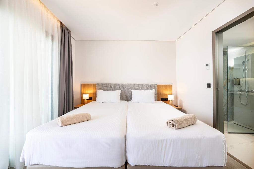 Athina Palace Resort & Spa - Tap to explore photos