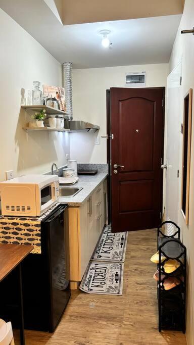 Cozy Studio Condo Unit at Fullerton Suites - Tap to explore photos