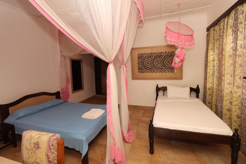 Makuti Villas Resort Room Type - Triple Room