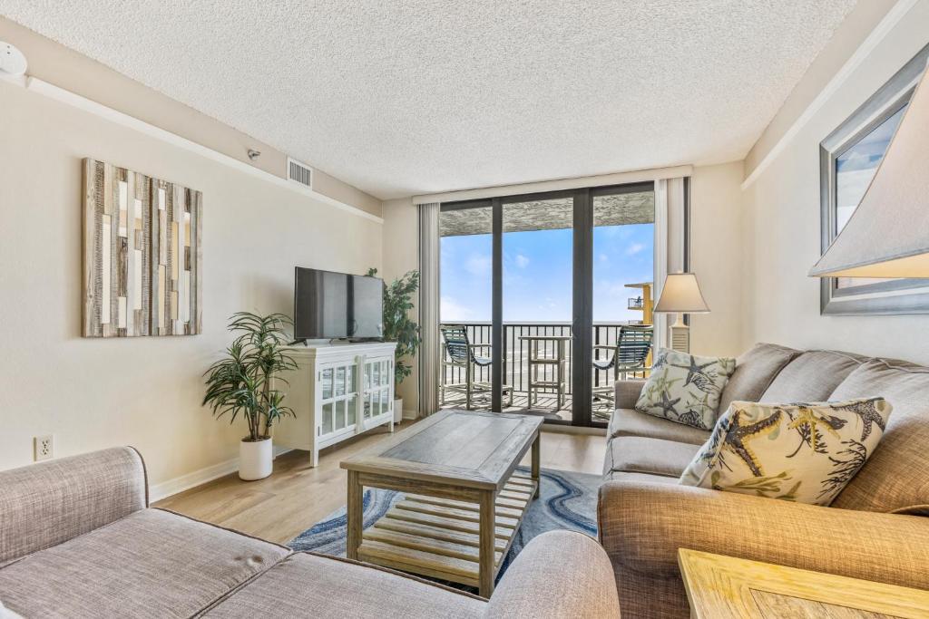 Ocean View with a beachfront pool at Ocean Trillium Condo ~ 702 image