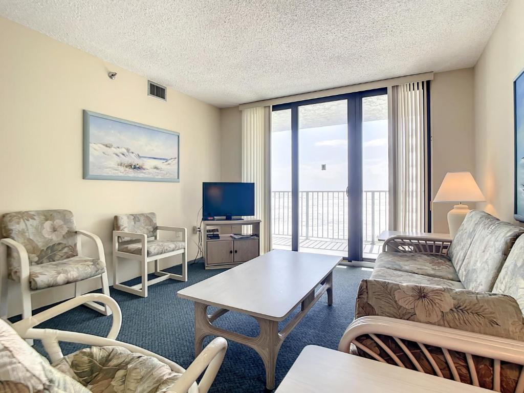 Ocean View with a beachfront pool at Ocean Trillium Condo ~ 402 image