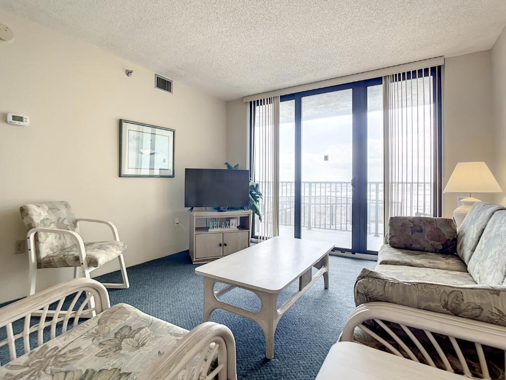Ocean View with a beachfront pool at Ocean Trillium Condo ~ 204 image