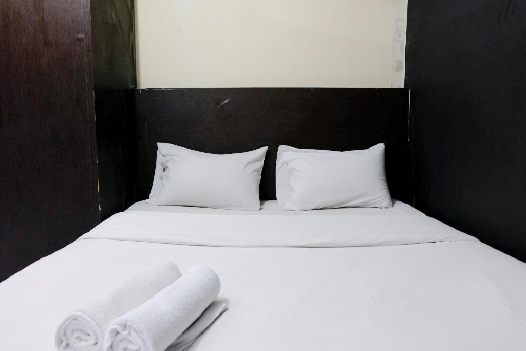 Tranquil Designed 2BR at Gateway Ahmad Yani Cicadas Apartment By Travelio, Bandung