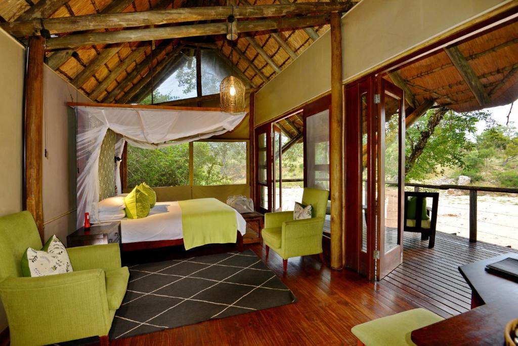 Rhino Post Safari Lodge - Tap to explore photos