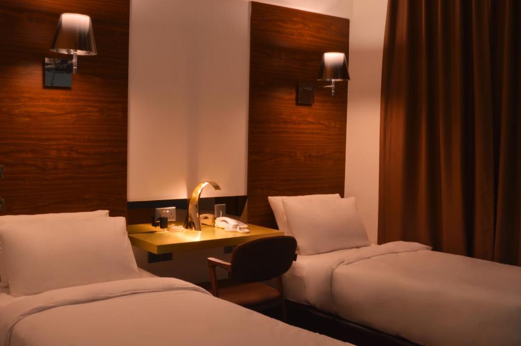 Двухместный (Двухместный номер Делюкс с 2 отдельными кроватями), Melange Hotel Bukit Bintang