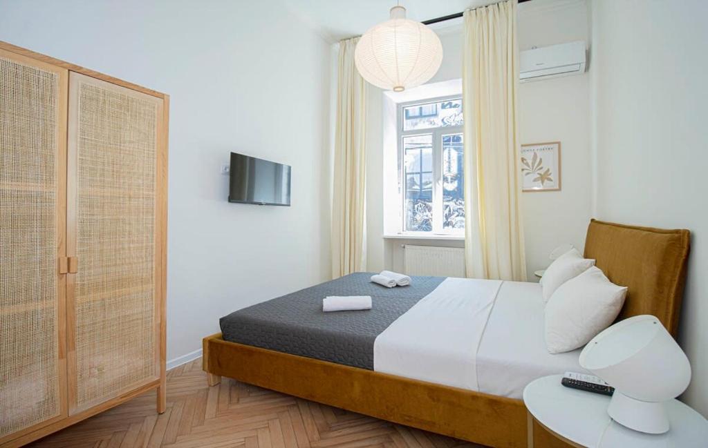 Chic 3BR Apt Near Fabrika - By Wehost - Tap to explore photos