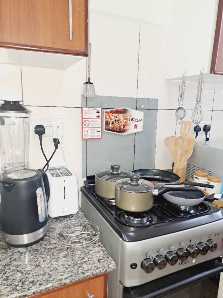Logic Stays 2 Bedroom Arusha City Centre - Tap to explore photos