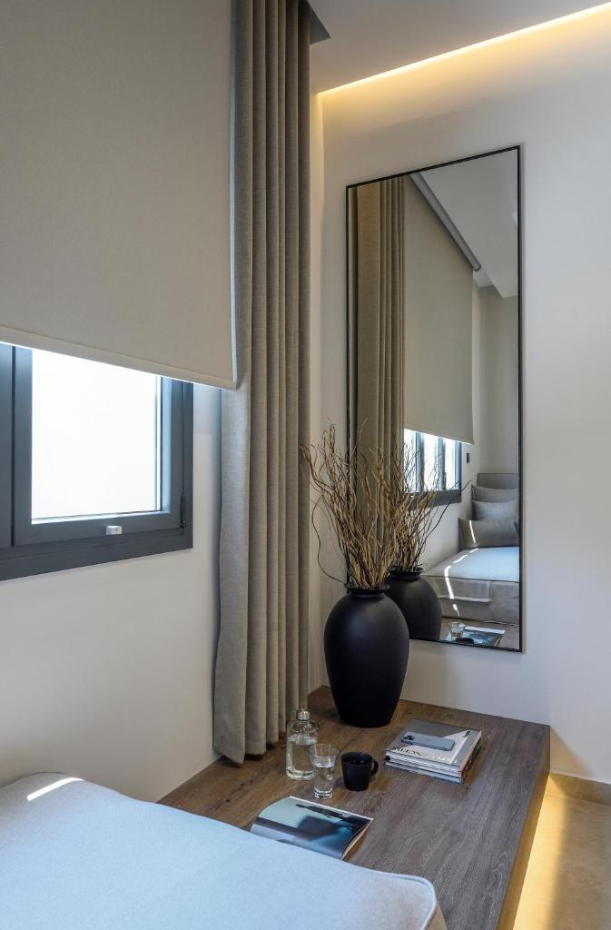 Loena Luxury Suites - Tap to explore photos