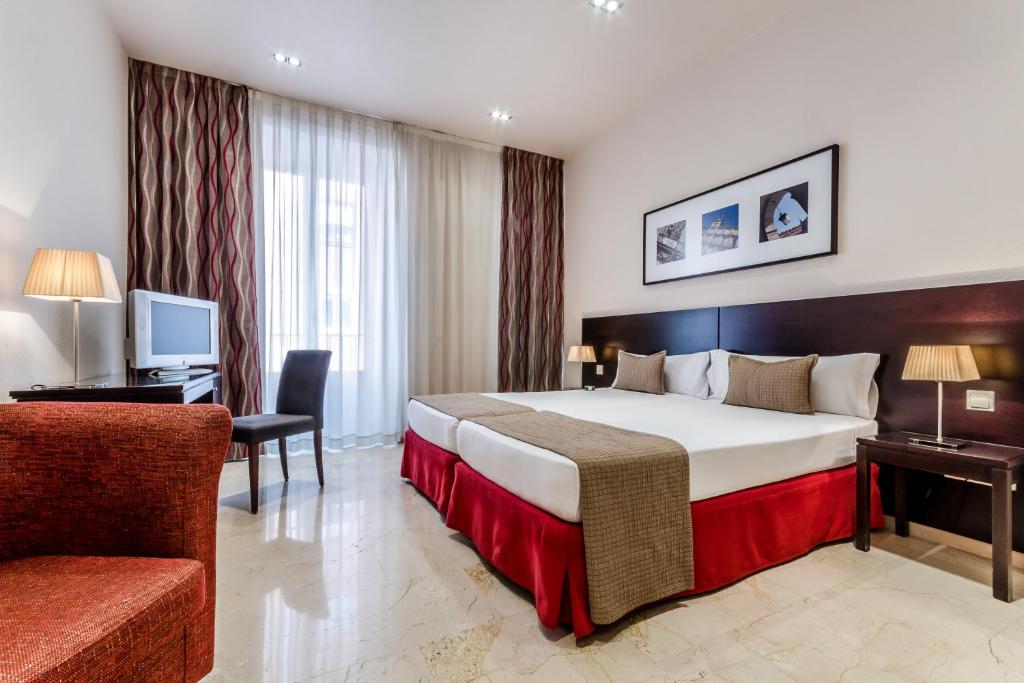 Hotel Exe Suites 33 - Tap to explore photos