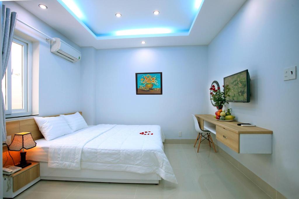 Двухместный (Двухместный номер Делюкс с 1 кроватью и балконом), An Phu Gia Apartment