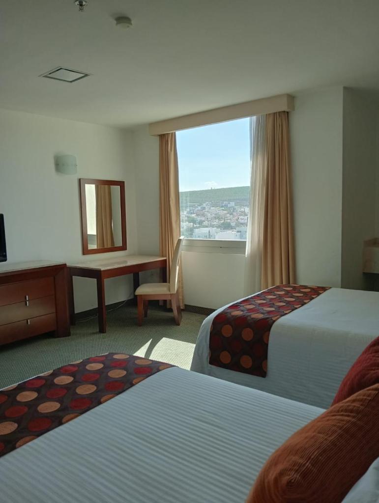 Hotel Ankara Las Lomas - Tap to explore photos