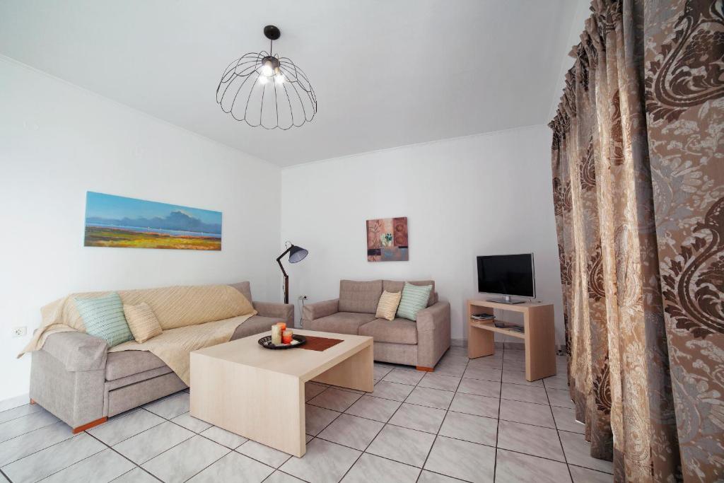 Minos Apartments & Studios - Tap to explore photos