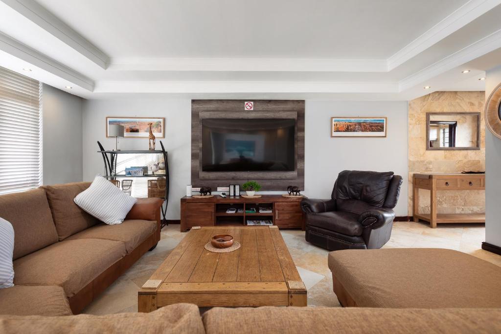 Luxury Beachfront 706 with AC, Workspace & Table Mountain Views - Tap to explore photos