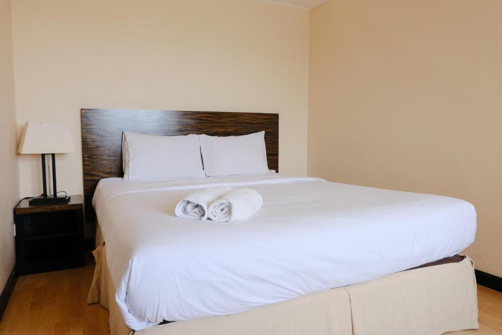Homey 2BR at Braga City Walk Apartment By Travelio