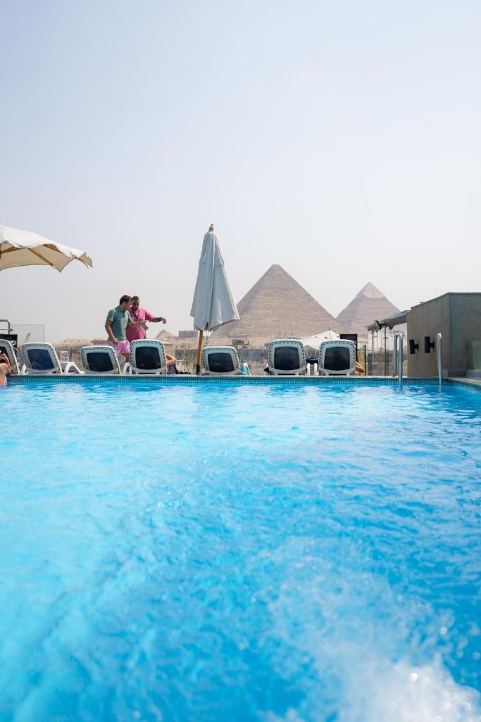 New Pyramid Front Hotel - Tap to explore photos