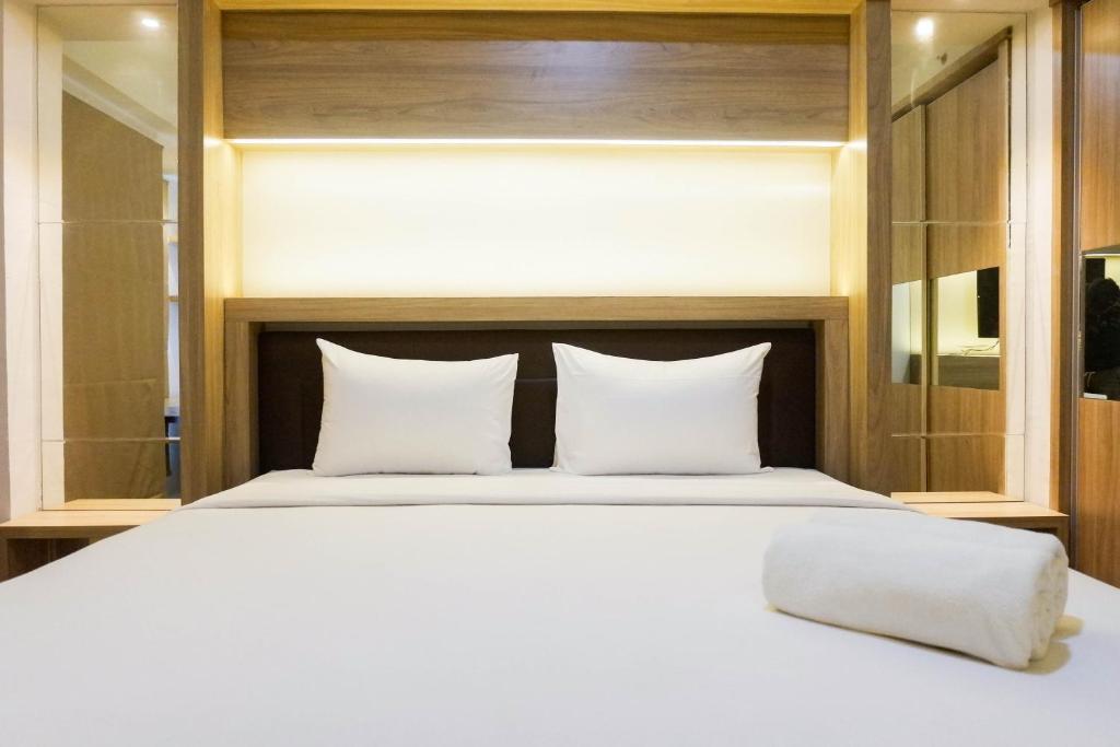High Floor Studio Apartment at Orchard Tower Supermall Mansion By Travelio, Surabaya