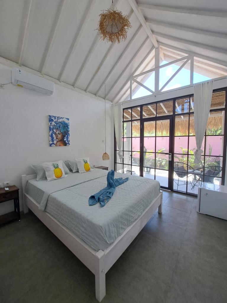 Coco Colada Bungalows - Tap to explore photos
