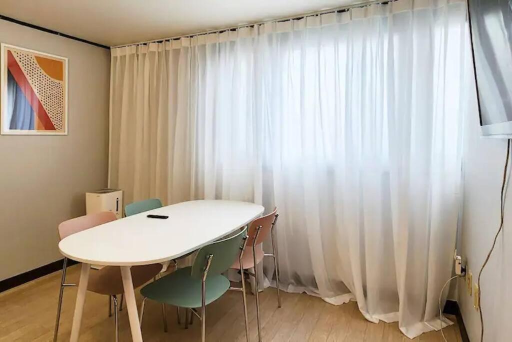 C-3 White Linen House - Tap to explore photos