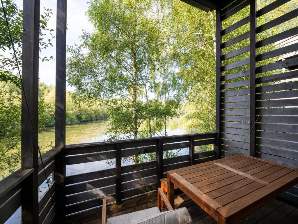Lakehouse with forest views by belvilla photo 1