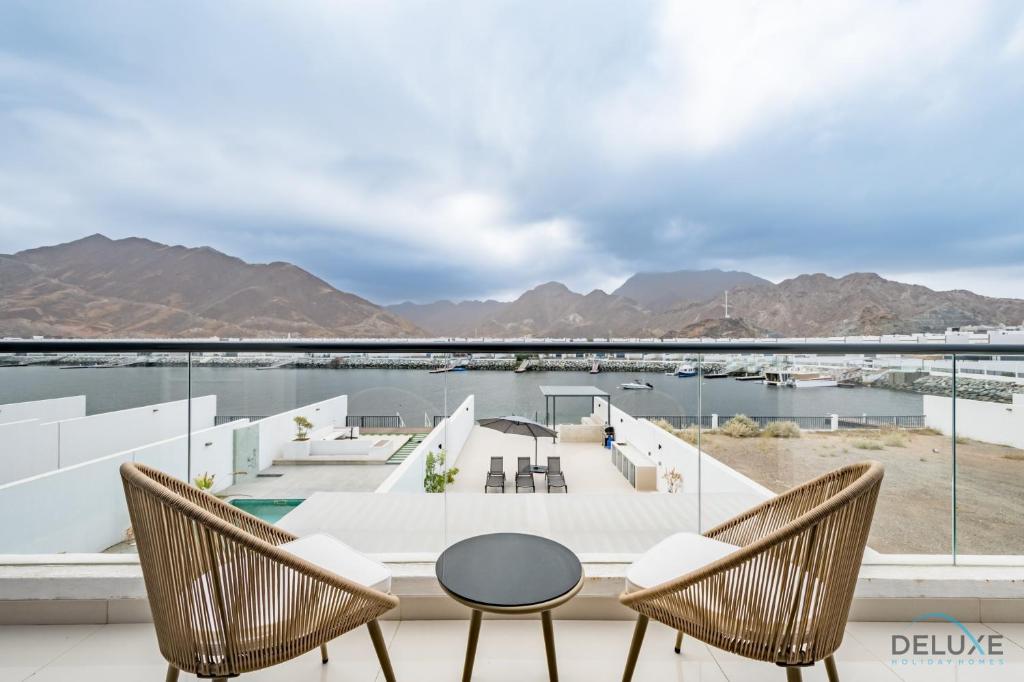 Deal of the Week 4BR with Pool, Sea & Mountain Views by Deluxe Holiday Homes photo 4