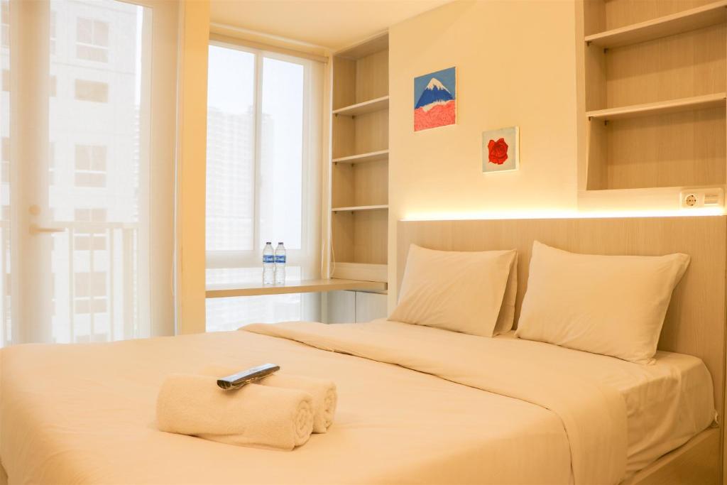 Nice and Homey Studio Tokyo Riverside PIK 2 Apartment By Travelio