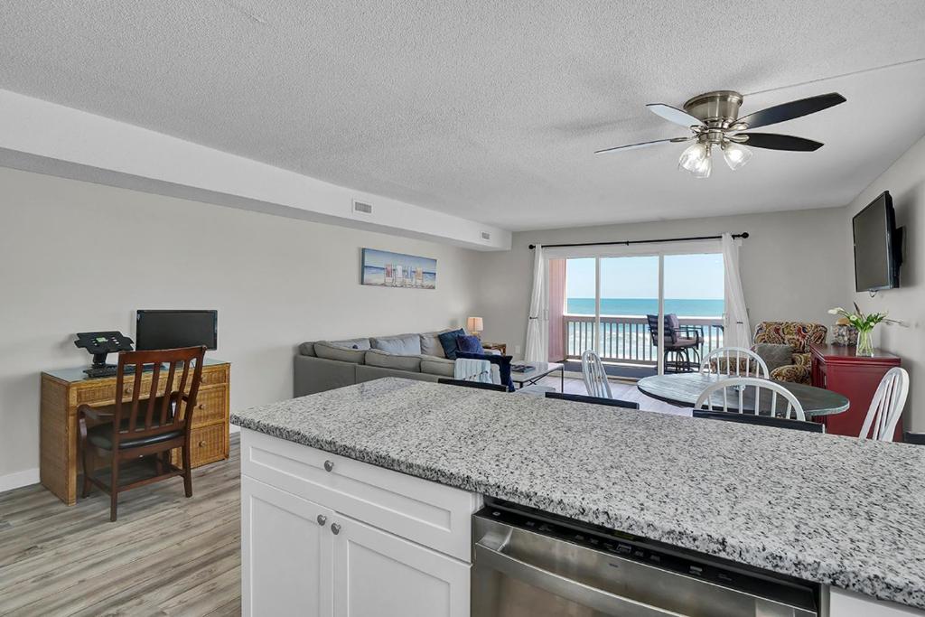 On The Rocks by Sea Scape Properties image