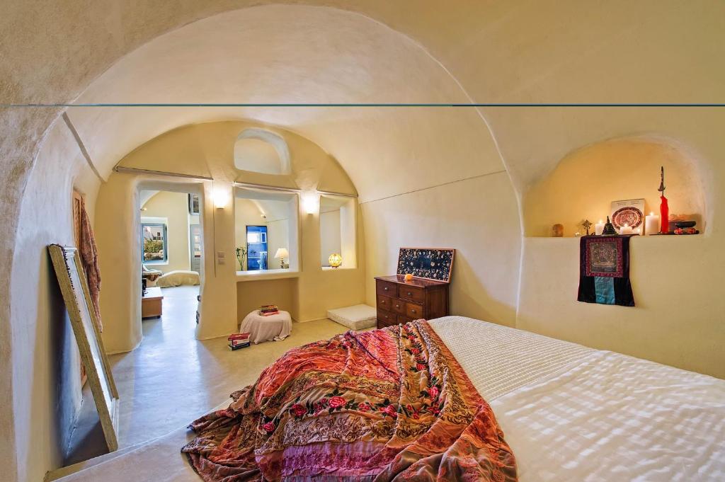 Real Santorini Cave House far From the Crowds - Tap to explore photos