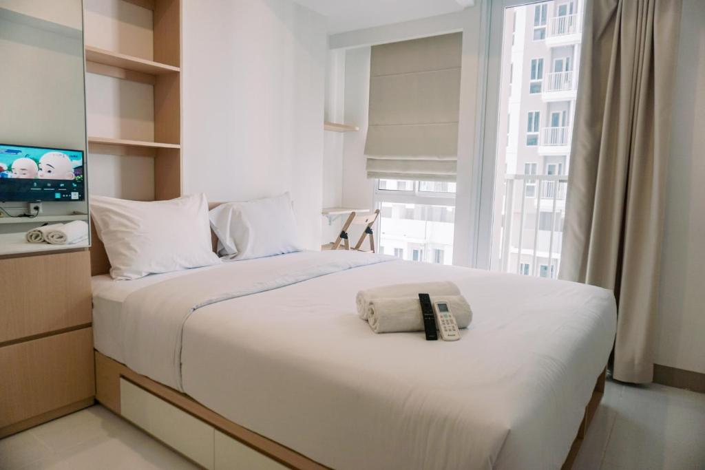 Relax and Comfy Studio at Tokyo Riverside PIK 2 Apartment By Travelio