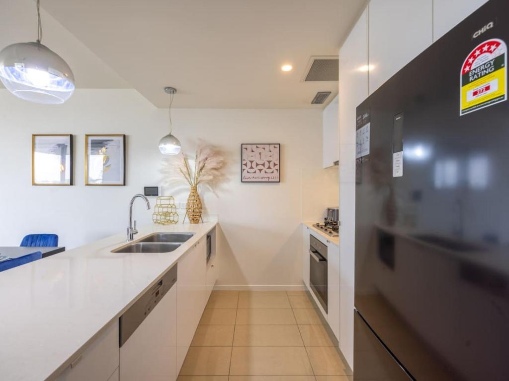 Modern 3BR Riverside APT w Parking near Shops and Park - Tap to explore photos