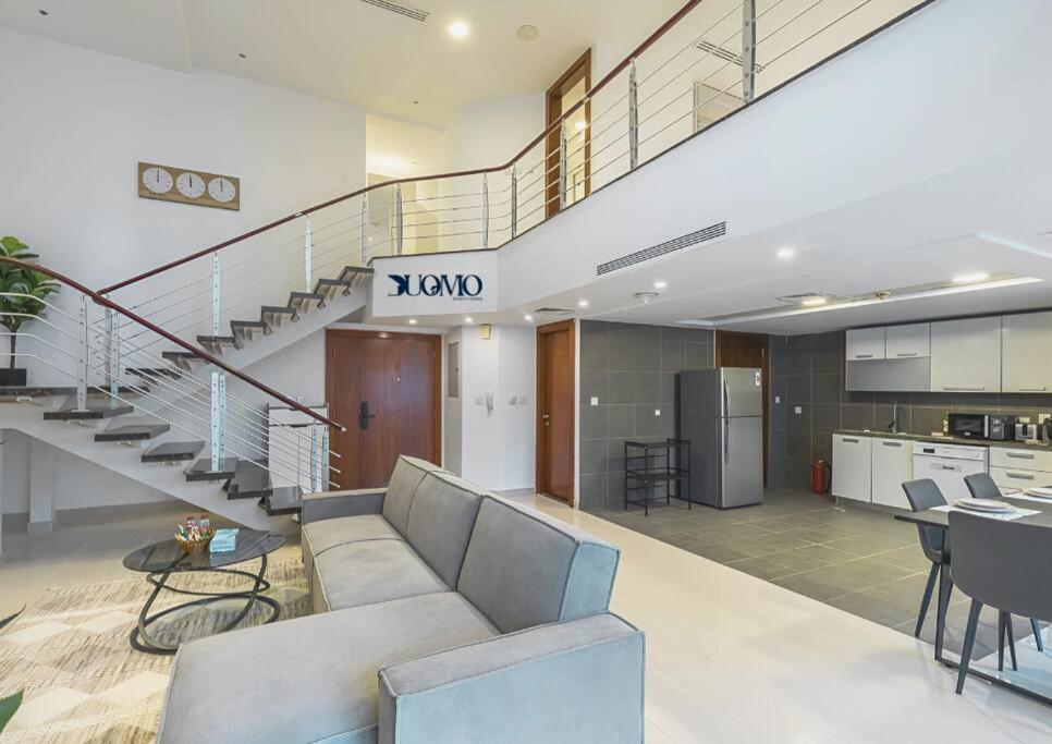 MyDuomo- Expansive 1BR duplex with Burj Khalifa view- 4002 photo 1