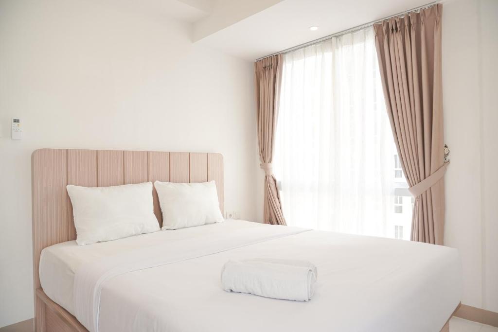 Best Deal and Homey 2BR Tokyo Riverside PIK 2 Apartment By Travelio, Tangerang