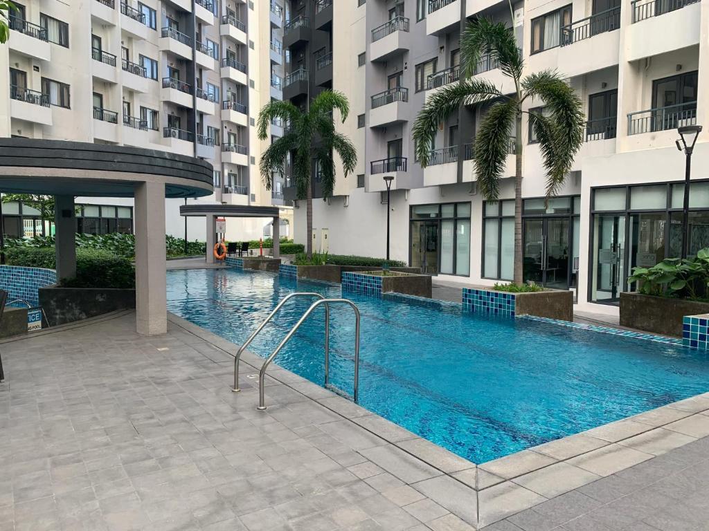 RG&J Paranaque Staycation at Spring Residences T4 - Tap to explore photos
