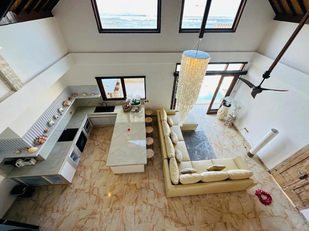 Bali Secrets Oceanfront Villas - Tap to explore photos