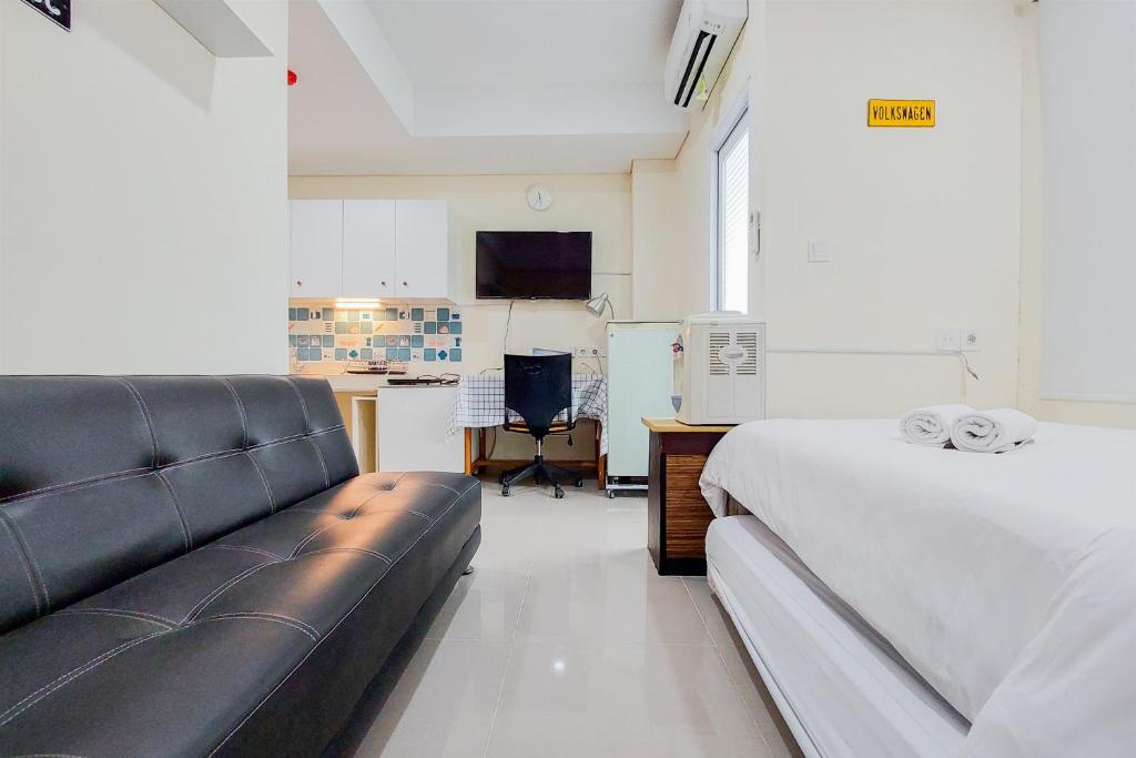 Fancy and Strategic Studio Apartment at B Residence By Travelio, Tangerang