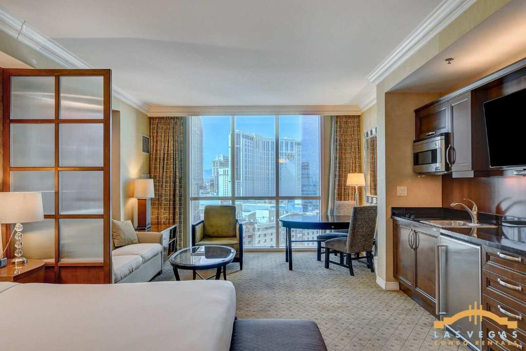 Strip Views, King Bed & Jacuzzi - MGM Signature - Tap to explore photos