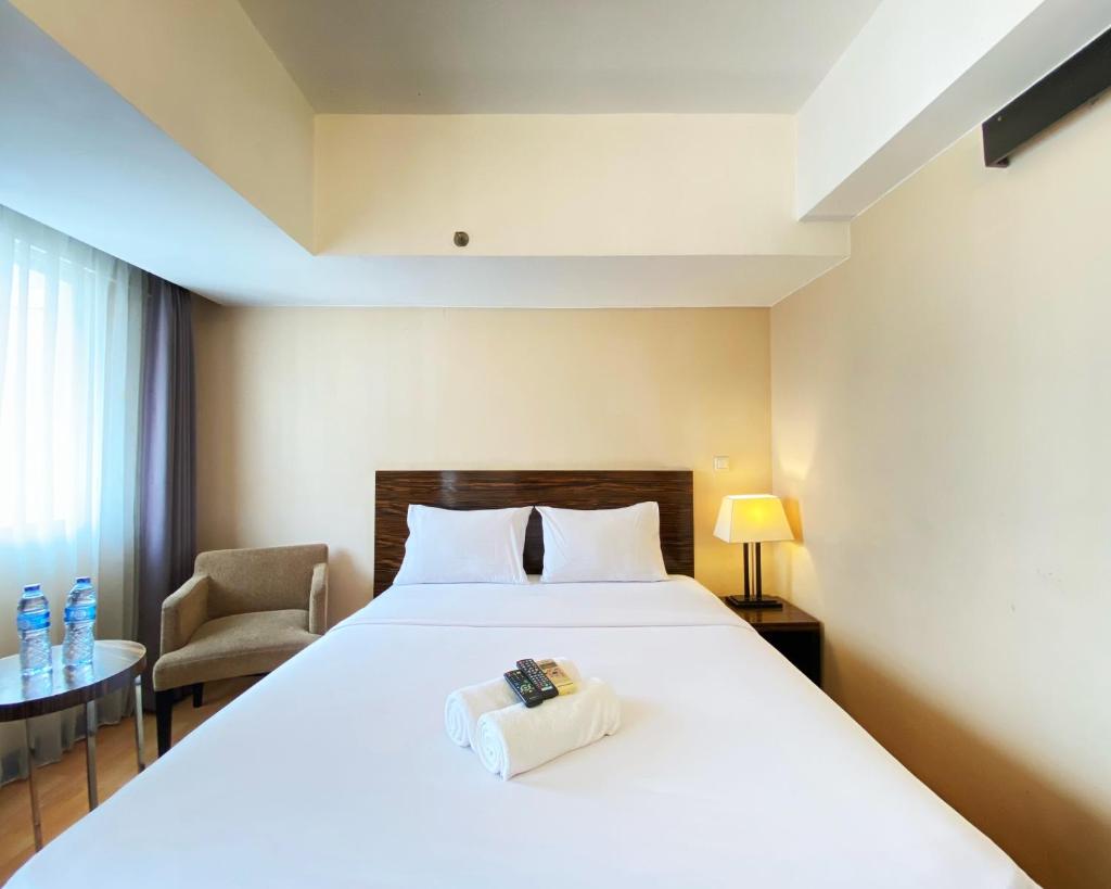 Cozy 1BR Apartment at Braga City Walk By Travelio