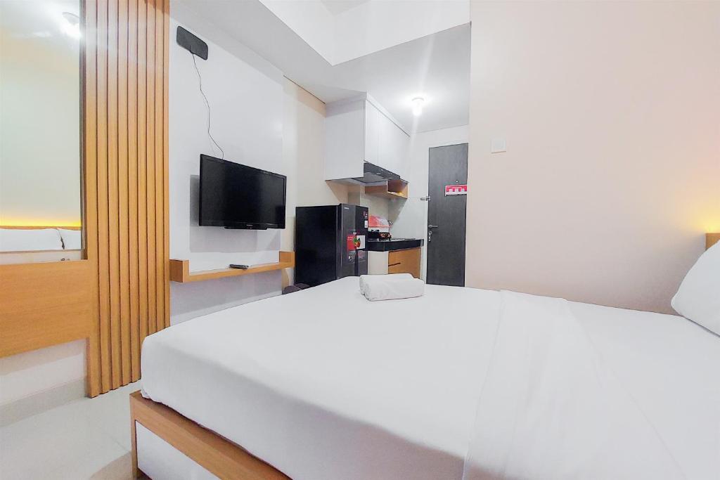 Minimalist Studio Apartment at Serpong Garden By Travelio